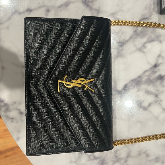 Yves Saint Laurent Handbags - YSL CASSANDRE MATELASSÉ ENVELOPE CHAIN. There is wear/makeup in interior. USED.